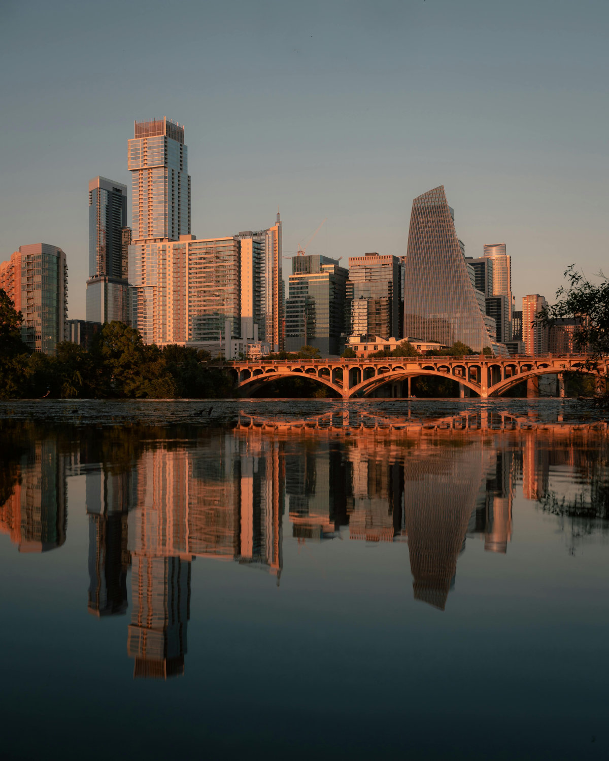 City skyline with a bridge over water